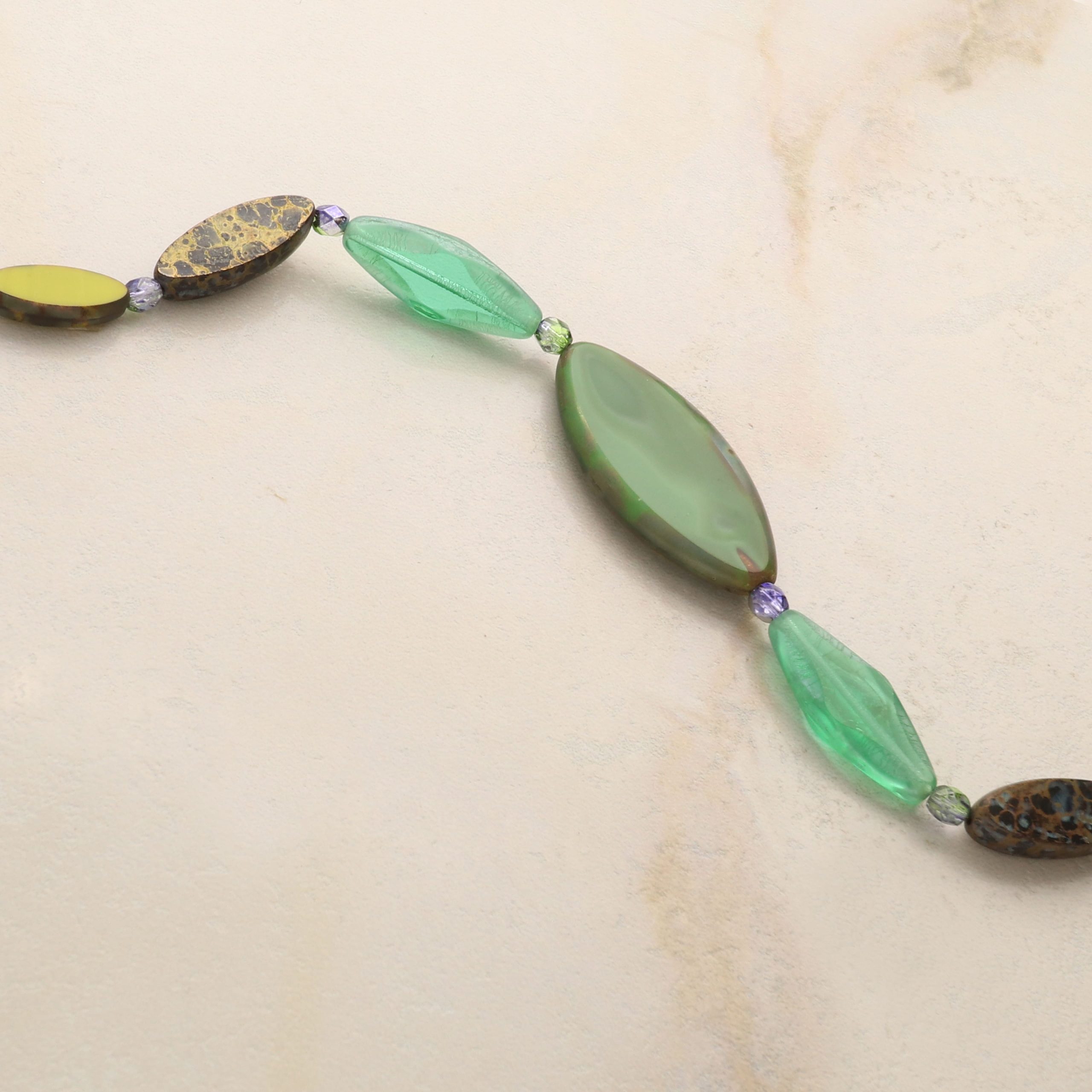 Smooth Green Czech Glass Oval Bead Mix by Bead Landing™ - Image 3