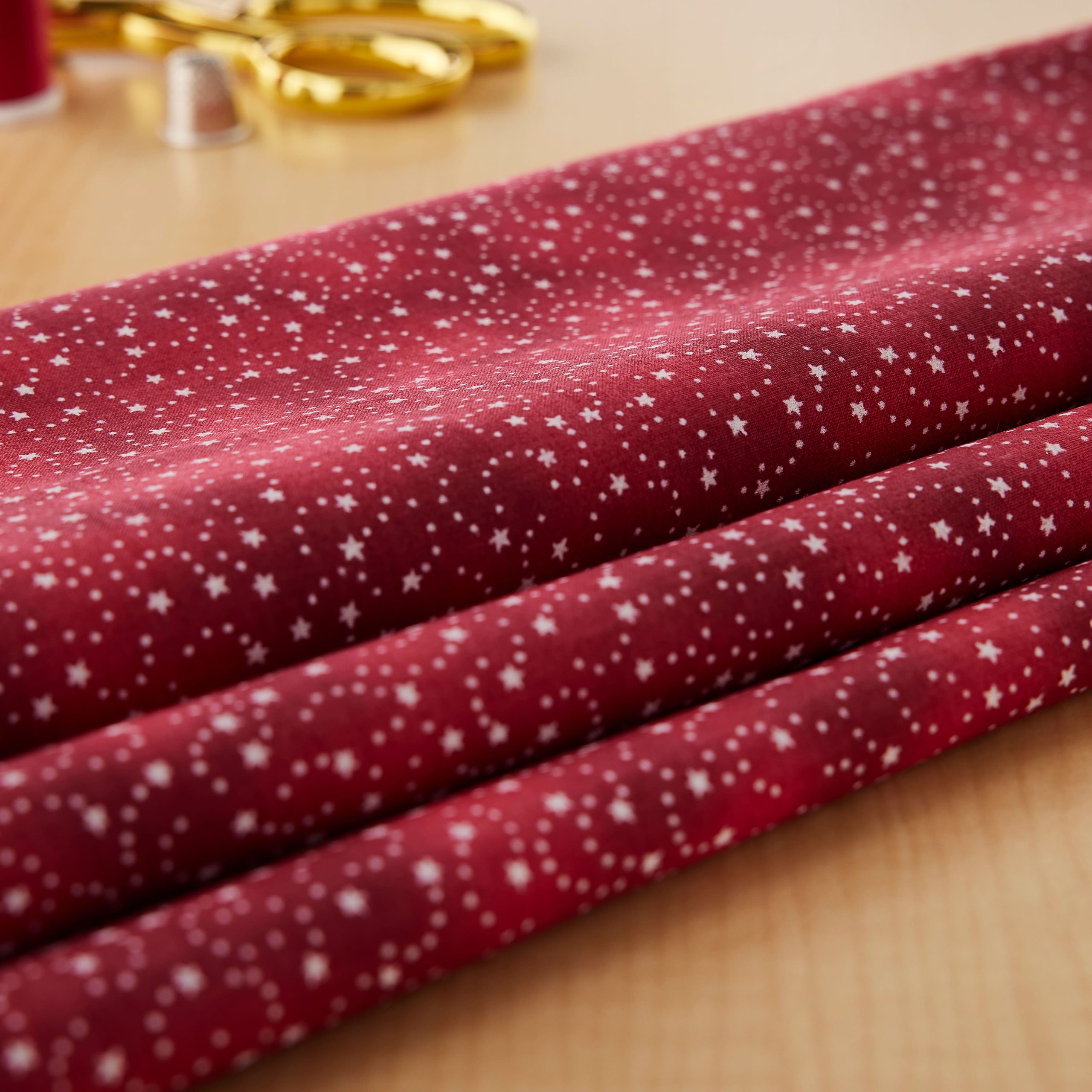 Fabric Traditions Red Swirling Stars Cotton Fabric - Image 2